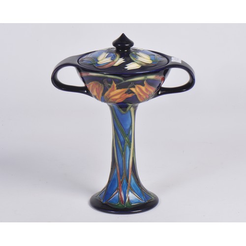894 - A Moorcroft Pottery bonboniere in the Loch Hope pattern, having Twin Handles to a slender body & fla... 