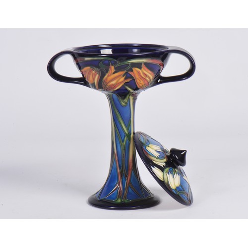 894 - A Moorcroft Pottery bonboniere in the Loch Hope pattern, having Twin Handles to a slender body & fla... 