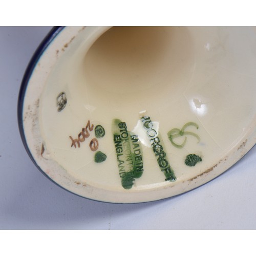 895 - A Moorcroft Pottery bonboniere in the Loch Hope pattern, having Twin Handles to a slender body & fla... 