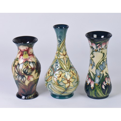 896 - Three various Moorcroft Pottery Vases decorated with Flowers Complete with Two Boxes & Paperwrork. M... 