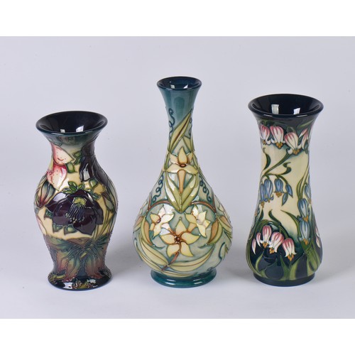896 - Three various Moorcroft Pottery Vases decorated with Flowers Complete with Two Boxes & Paperwrork. M... 