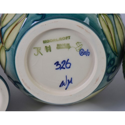 896 - Three various Moorcroft Pottery Vases decorated with Flowers Complete with Two Boxes & Paperwrork. M... 