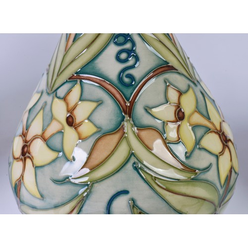 896 - Three various Moorcroft Pottery Vases decorated with Flowers Complete with Two Boxes & Paperwrork. M... 