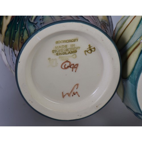 896 - Three various Moorcroft Pottery Vases decorated with Flowers Complete with Two Boxes & Paperwrork. M... 