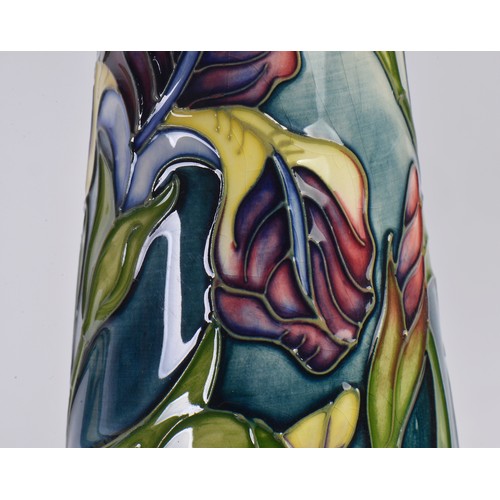 897 - Two White Ground Moorcroft pottery Ewer Jugs Complete with One Box & Paperwork. Measuring: 24cms hig... 