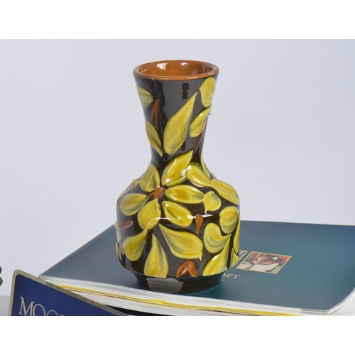 898 - Two Moorcroft Pottery Jugs Complete with Boxes & Paperwork, a Moorcroft Book, etc.