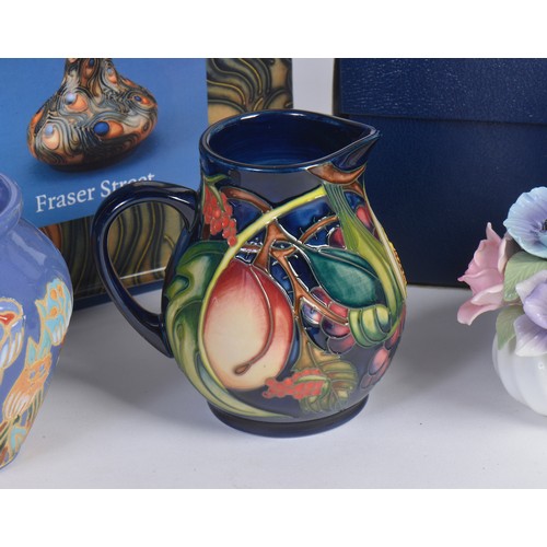 898 - Two Moorcroft Pottery Jugs Complete with Boxes & Paperwork, a Moorcroft Book, etc.