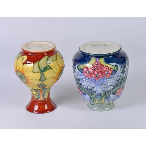 899 - A Sunflower Moorcroft Vase & one other decorated in the Art Nouveau style Complete with Boxes & Pape... 