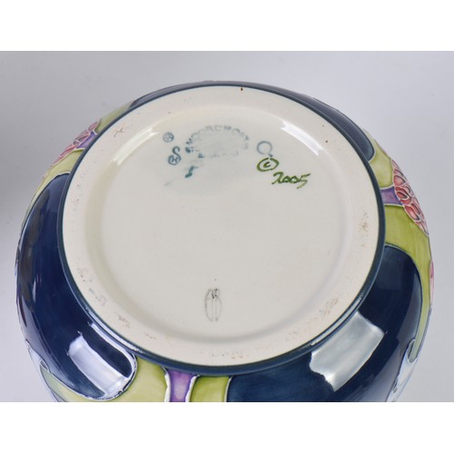 899 - A Sunflower Moorcroft Vase & one other decorated in the Art Nouveau style Complete with Boxes & Pape... 