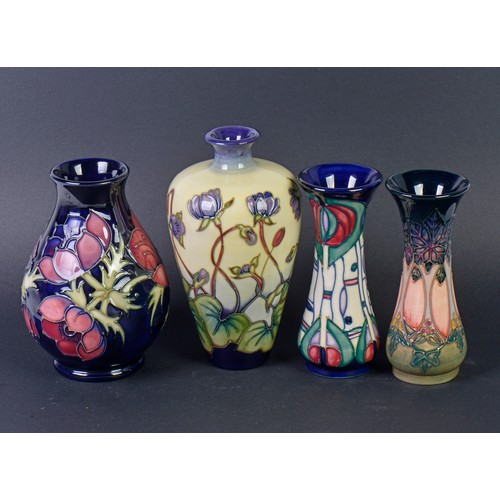 900 - Four various Moorcroft Vases. Measuring: 15cms High. (Highest).