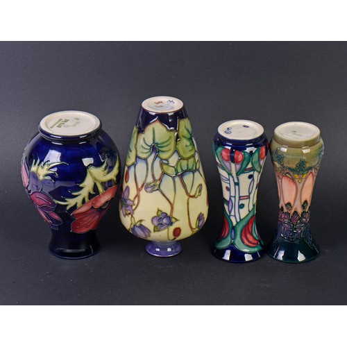 900 - Four various Moorcroft Vases. Measuring: 15cms High. (Highest).