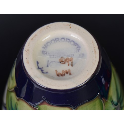 900 - Four various Moorcroft Vases. Measuring: 15cms High. (Highest).