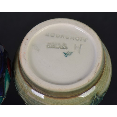 900 - Four various Moorcroft Vases. Measuring: 15cms High. (Highest).