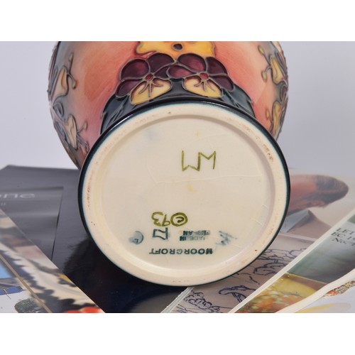 902 - A Moorcroft Blue Glazed Candlestick & a similar Fuchsia designed Vase Complete with Boxes & Paperwor... 