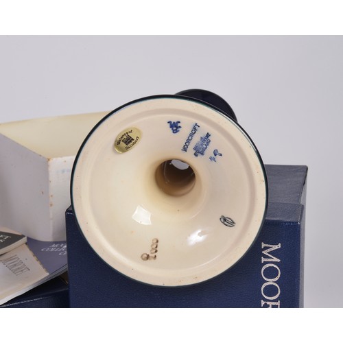 902 - A Moorcroft Blue Glazed Candlestick & a similar Fuchsia designed Vase Complete with Boxes & Paperwor... 