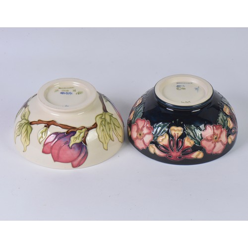 905 - Two Moorcroft Bowls decorated with Flowers Complete with Boxes & Paperwork. Measuring: 16cms across.