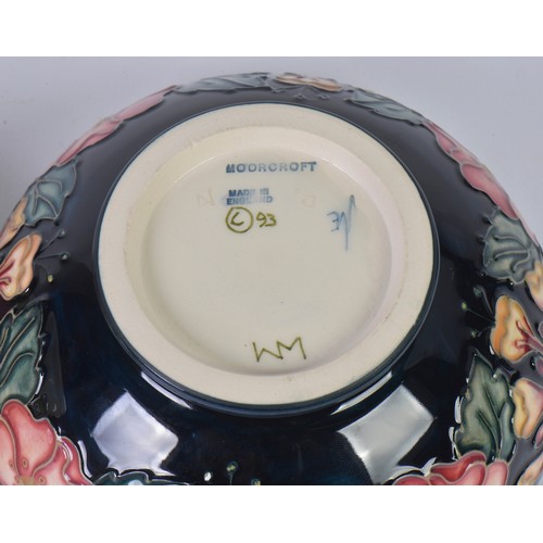 905 - Two Moorcroft Bowls decorated with Flowers Complete with Boxes & Paperwork. Measuring: 16cms across.