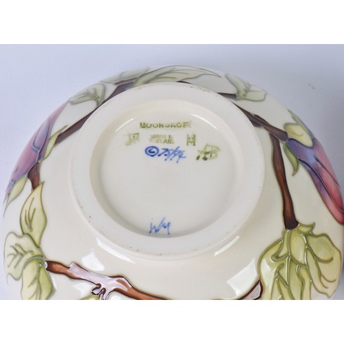 905 - Two Moorcroft Bowls decorated with Flowers Complete with Boxes & Paperwork. Measuring: 16cms across.