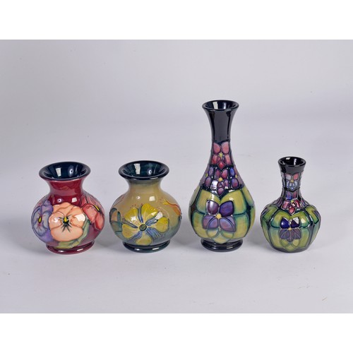 907 - Four various Moorcroft Vases Complete with Original Boxes & Paperwork. Measuring: 18cms. High. (High... 