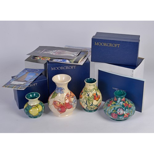 908 - Four various Moorcroft vases of Squat & Flared necked form Complete with the Original Boxes & Paperw... 