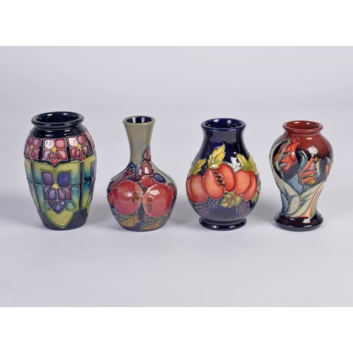909 - Four various Moorcroft Vases Complete with Original Boxes & Paperwork. Measuring: 10cms High. (Appro... 