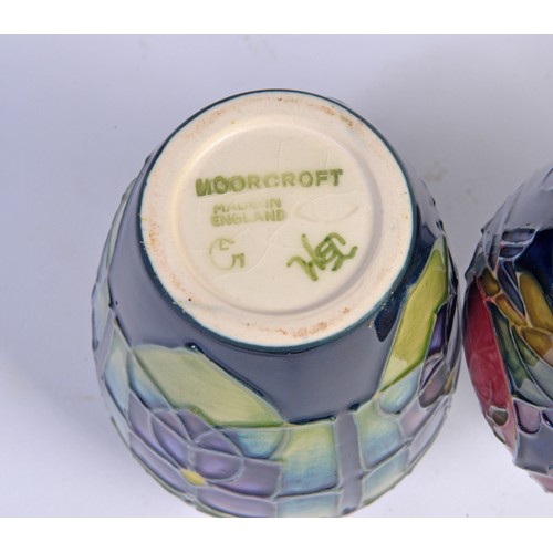 909 - Four various Moorcroft Vases Complete with Original Boxes & Paperwork. Measuring: 10cms High. (Appro... 