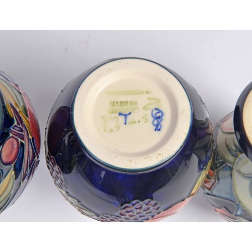 909 - Four various Moorcroft Vases Complete with Original Boxes & Paperwork. Measuring: 10cms High. (Appro... 