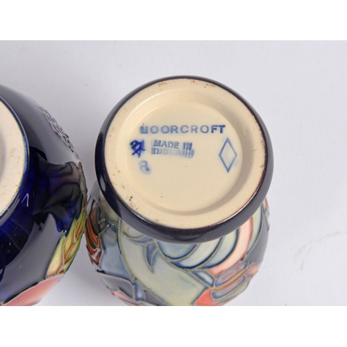 909 - Four various Moorcroft Vases Complete with Original Boxes & Paperwork. Measuring: 10cms High. (Appro... 