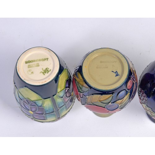 909 - Four various Moorcroft Vases Complete with Original Boxes & Paperwork. Measuring: 10cms High. (Appro... 