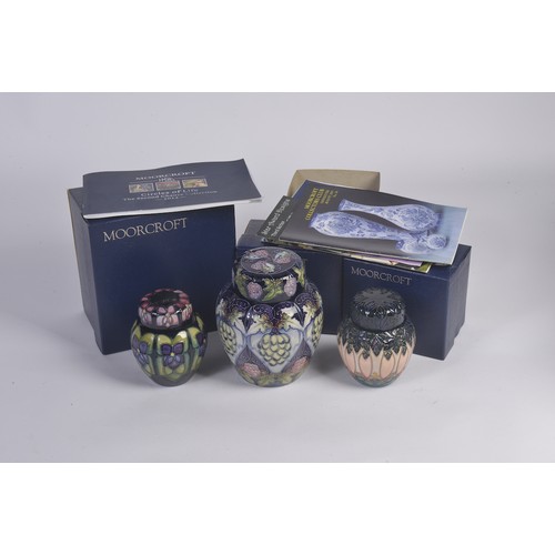 910 - A Grape decorated Moorcroft Ginger Jar & Cover along with Two Smaller Moorcroft Ginger Jars & Covers... 