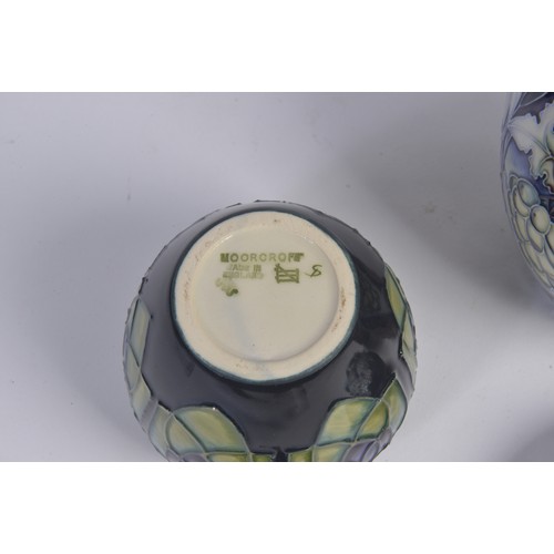 910 - A Grape decorated Moorcroft Ginger Jar & Cover along with Two Smaller Moorcroft Ginger Jars & Covers... 