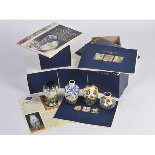 911 - Four various Moorcroft Vases Complete with Boxes & Paperwork. Measuring: 9.5cms. (Approx).