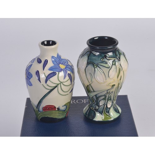 911 - Four various Moorcroft Vases Complete with Boxes & Paperwork. Measuring: 9.5cms. (Approx).