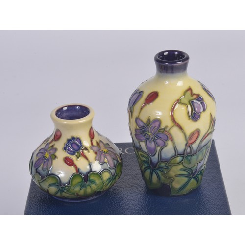 911 - Four various Moorcroft Vases Complete with Boxes & Paperwork. Measuring: 9.5cms. (Approx).