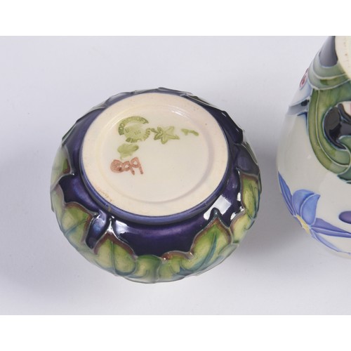 911 - Four various Moorcroft Vases Complete with Boxes & Paperwork. Measuring: 9.5cms. (Approx).