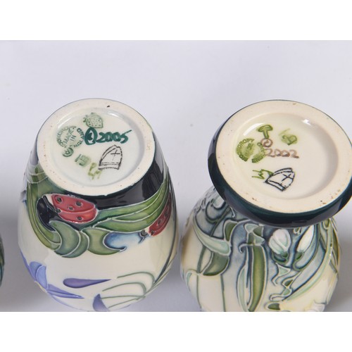 911 - Four various Moorcroft Vases Complete with Boxes & Paperwork. Measuring: 9.5cms. (Approx).