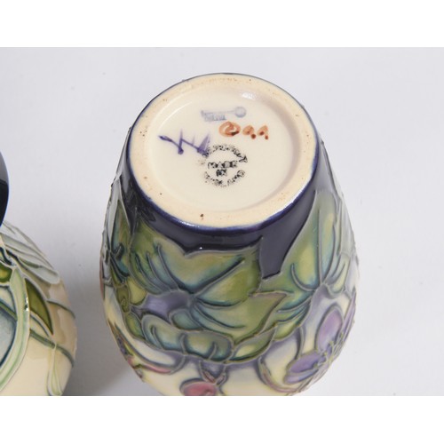 911 - Four various Moorcroft Vases Complete with Boxes & Paperwork. Measuring: 9.5cms. (Approx).