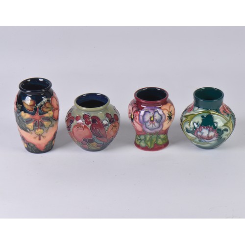 913 - Four various Moorcroft Vases Complete with Boxes & Paperwork. Measuring: 10cms. (Approx).