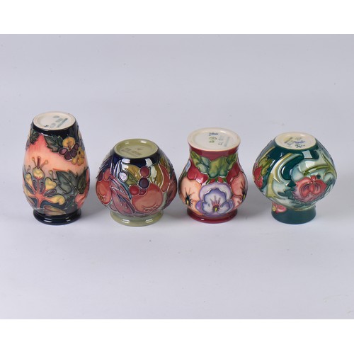 913 - Four various Moorcroft Vases Complete with Boxes & Paperwork. Measuring: 10cms. (Approx).