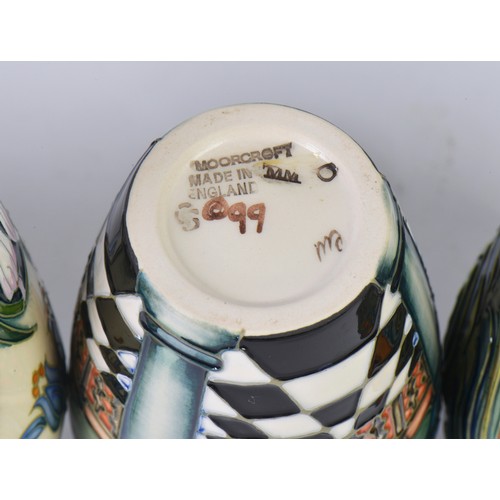 914 - Four various Moorcroft Vases Complete with Boxes & Paperwork. Measuring: 14cms High. (Approx).