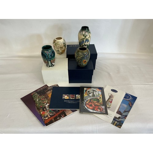 914 - Four various Moorcroft Vases Complete with Boxes & Paperwork. Measuring: 14cms High. (Approx).