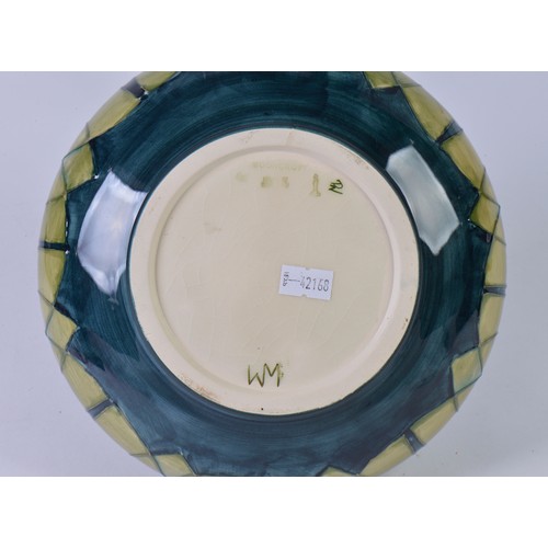 917 - An Art Nouveau design Squat patterned Moorcroft Vase decorated in Purple & Green Complete with Origi... 