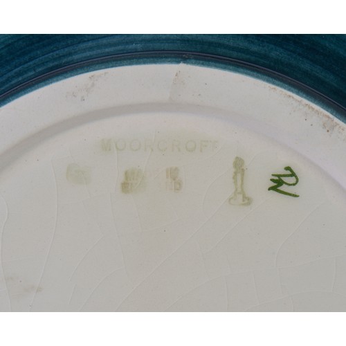 917 - An Art Nouveau design Squat patterned Moorcroft Vase decorated in Purple & Green Complete with Origi... 