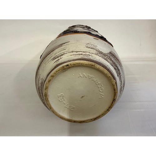 922 - A Fat Lava German made Runny Glazed Vase decorated with Flowers & Flaming Ears. Measuring: 54cms.