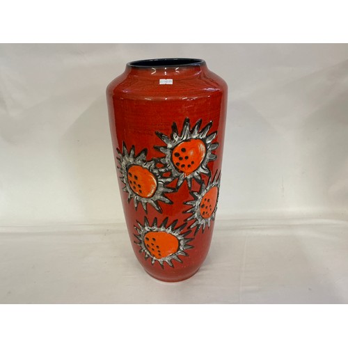 924 - A Fat Lava German Red Glazed & Floral decorated Vase with Runny Glaze. Measuring: 49cms high.