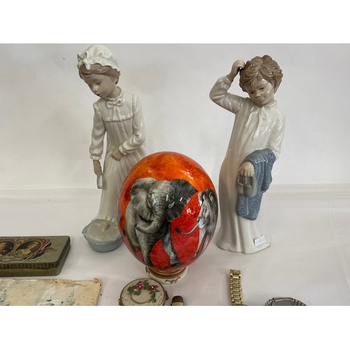 926 - A Pair of Nao Figurines, a Painted Ostrich Egg by Stanley Rowe, three Wristwatches, Queen Victoria B... 