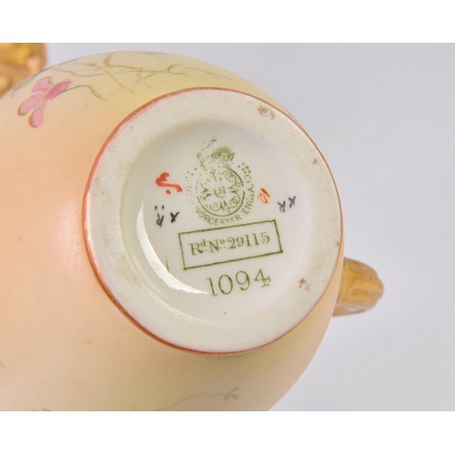 928 - A Royal Worcester Vase decorated with Summer Flowers along with a Royal Worcester Peach ground Jug d... 