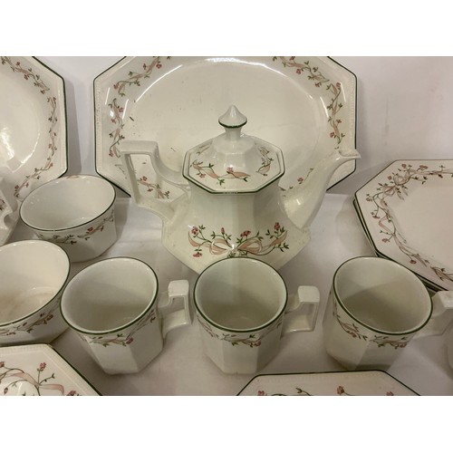 933 - A Johnson Brothers Dinner & Tea Service in the 