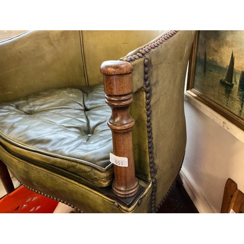 651 - A Mahogany Framed Green Leather & Studied Hoop Back chair resting on turned Legs.