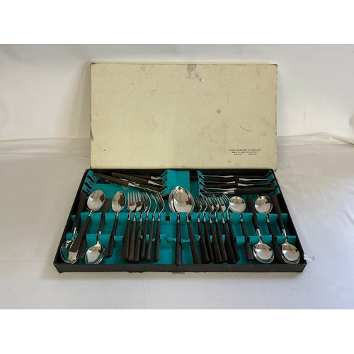 121 - A Joseph Rodgers & Sons 1960s Ebony & Steel Stylish Cutlery set in Original Box.